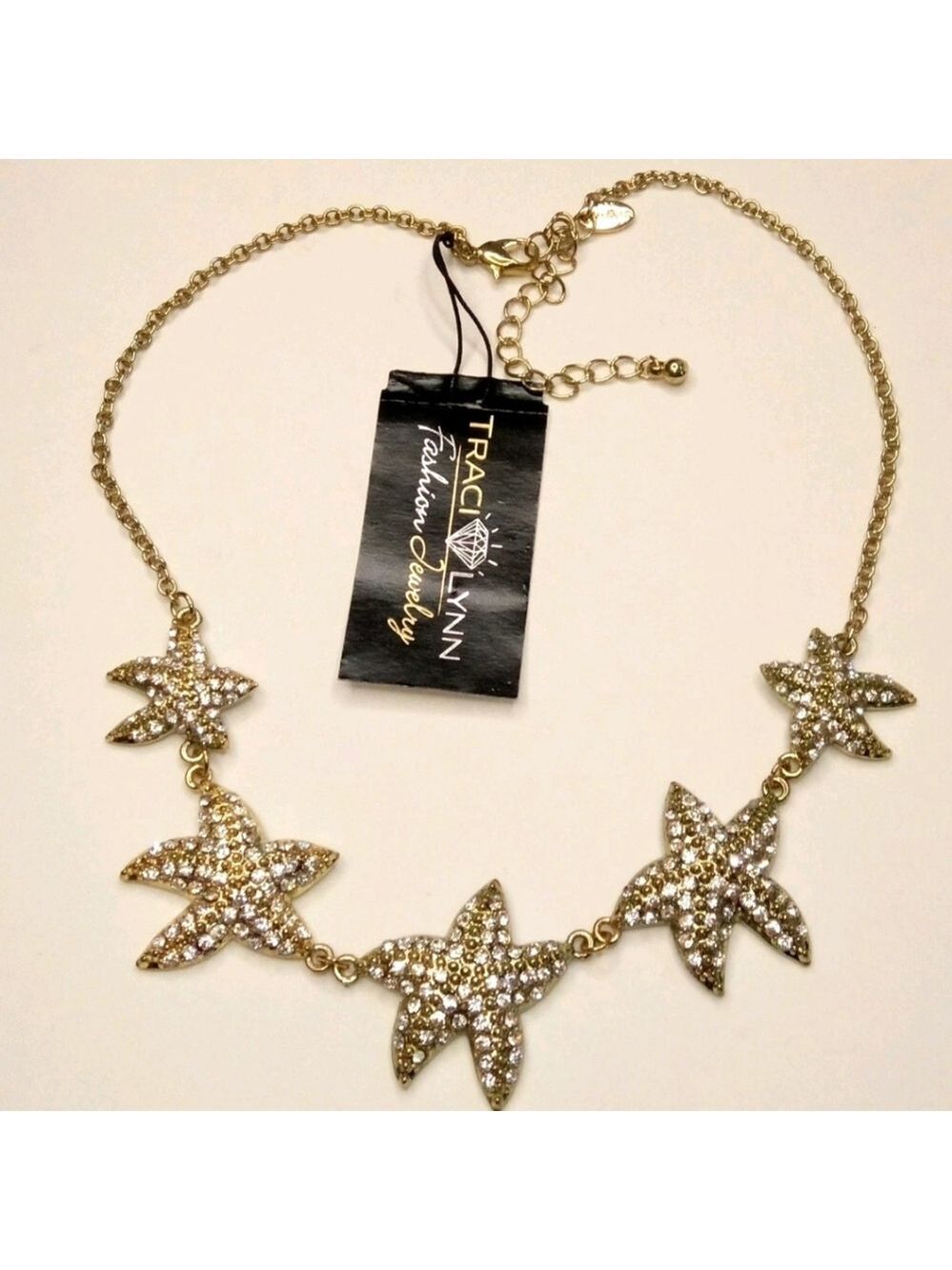 Traci Lynn"Sea Stars"Rhinestone Studded StarFish GoldTone Statement Necklace - Picture 8 of 9